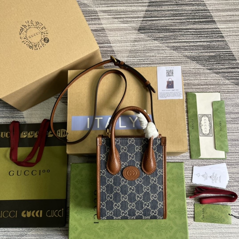 G*u*i shopping bags